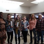 Laura Sargent and Jamus Sargent, Imprisoned Show crew members (far right), Bukola Oriola (far left) and students (in the middle)